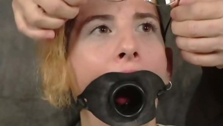 Dude puts the mask on sex-slave before punishing her throat